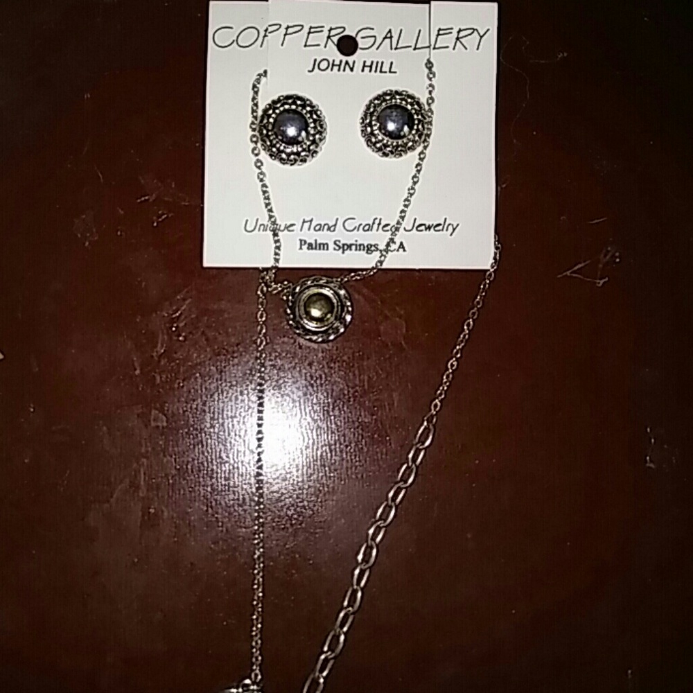 Silver earrings and matching necklace
